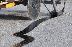 Extend Pavement Life with Hot Tar Crack Filling